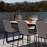 Patio Chair no. One S1 mit taupefarbener Sitzschale und schwarzem pulverbeschichtetem Stahlgestell draußen auf Terrasse | Patio Chair no. One S1 - Olive/Black | SACKit