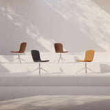 Chair no. One S1 Polished Swivel in Luna Sandstone with polished aluminum swivel base and leather upholstery