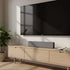Schlanke Wave Soundbar in neutralem Design aus Textil und Kunststoff, geeignet für Musik und TV.
