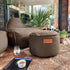 Runder Cobana Pouf in grauem, scheuerbeständigem Stoff mit handgenähten Details. | Cobana Pouf - Cobana Brown | SACKit