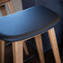 Nordic Bar Stool aus massiver Eiche mit Terra Black Lederpolster und schwarzer Stahlfußstütze, 73 cm hoch