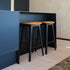 Nordic Bar Stool mit schwarzem Eichenholz und Terra Black Lederpolster, minimalistisches Design | Nordic Bar Stool - Black Stained Oak - 68 cm Luna Sandstone | SACKit
