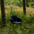 Schwarzer Chair no. One S2 mit gepolstertem Leder und pulverbeschichtetem Stahlrahmen vor hellem Hintergrund | Chair no. One S2 - Terra Black | SACKit