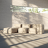 Beiges modulares boneless Sofa von sackit in einem hellen Innenraum mit weichen Sitzmodulen und langen Schatten durch das Fenster