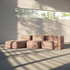Weiches boneless Sofa für drei Personen mit integriertem Lounger in warmem Beige, frei zusammengestellt in einem hellen Wohnraum mit natürlichem Licht