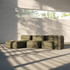 Modulares boneless Sofa von sackit in olivgrünem Stoff mit drei Sitzmodulen in einem hellen Raum mit warmem Sonnenlicht und markanten Schattenm 的
