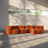 Vier-Sitzer Ecksofa Soft Sofa Indoor in orangefarbenem Jaquardstoff mit modularer Bauweise.