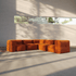 Oranges modulares Sofa mit weichen gepolsterten Elementen in einem hellen Innenraum mit warmem Sonnenlicht und großzügiger Sitzecke
