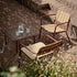 Quadratischer Mollis Coffee Table aus pulverbeschichtetem Aluminium mit getöntem Glas in Chestnut auf Terrasse. | Mollis Coffee Table - Chestnut | SACKit