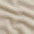 Nahaufnahme des cremefarbenen strukturierten Polsterstoffs vom sackit Cobana Lounge Sofa mit weich wirkender Oberfläche | Cobana Lounge Sofa - 3 Seater Chaise - Boucle Beige Ohne Armlehnen | SACKit